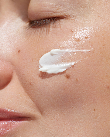 woman with dewy, glowing skin
