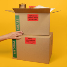 “Inspect for Damage” and “Mixed Merchandise” package label stickers with permanent adhesive on boxes